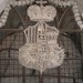 Grb družine izdelan it kosti, katere last je bilo posestvo na kateri dandanes stoji cerkev