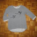 Zelo lep puloverček št 176 - 3 eur