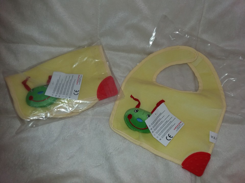 Slinček z grizalom in ropotuljico - foto povečava